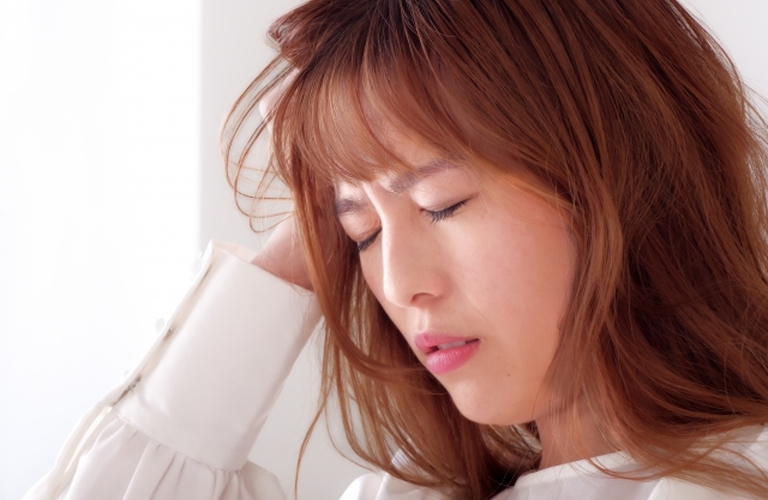 30代女性 週の半分は偏頭痛に悩みを当整体院で改善｜沖縄市で整体なら『陶板浴＆整体・揉みほぐし 村上』